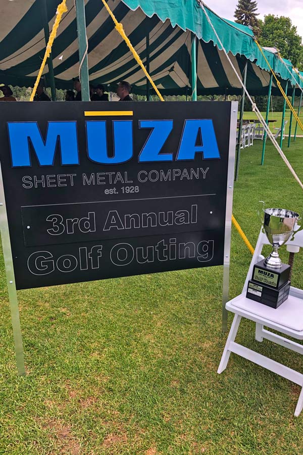 MUZA Golf outing sign